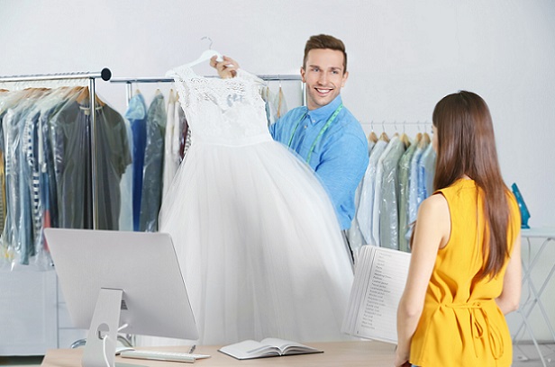 man,working,with,customer,in,dry cleaning,salon